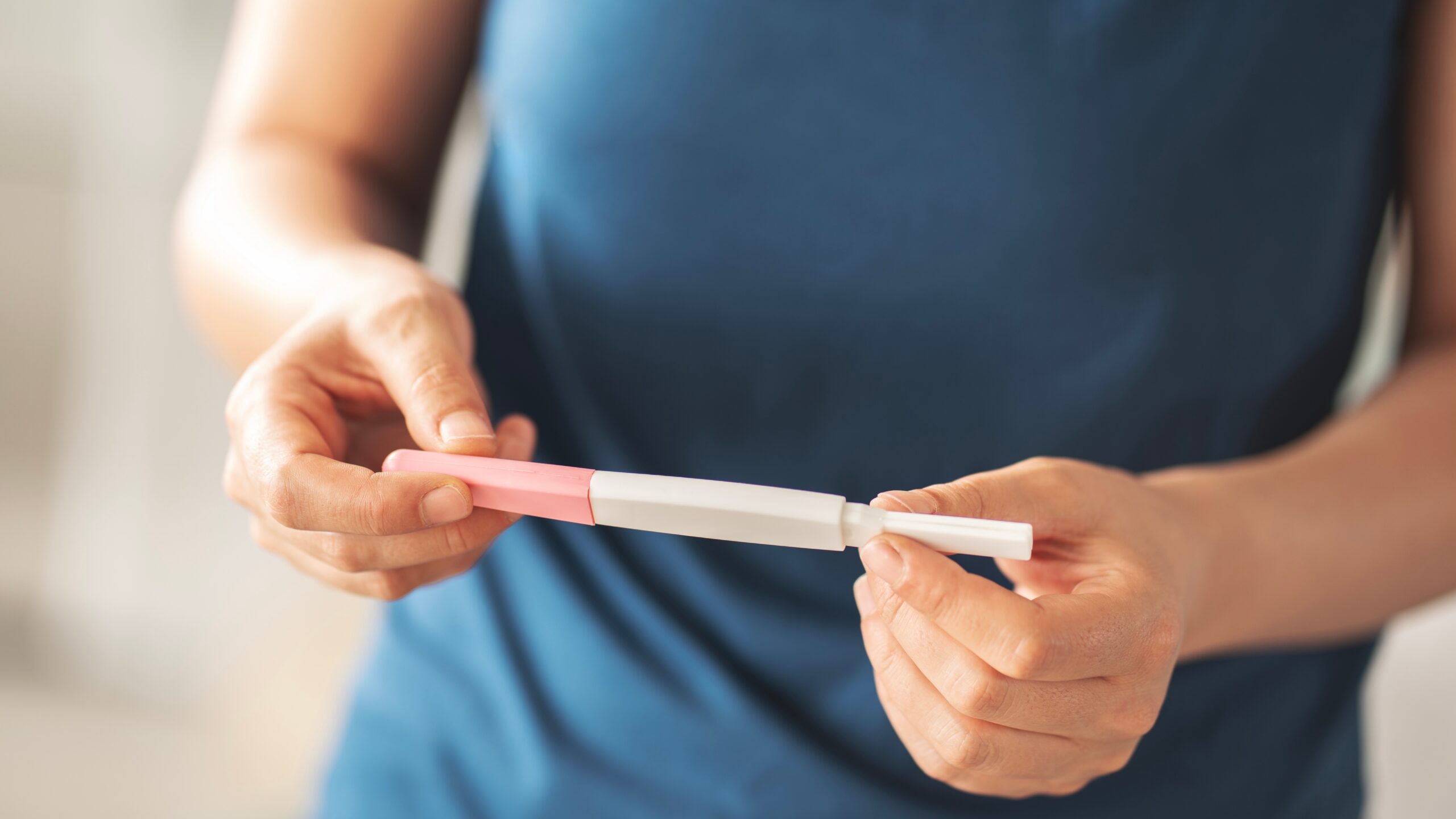 Woman waiting for pregnancy test result.