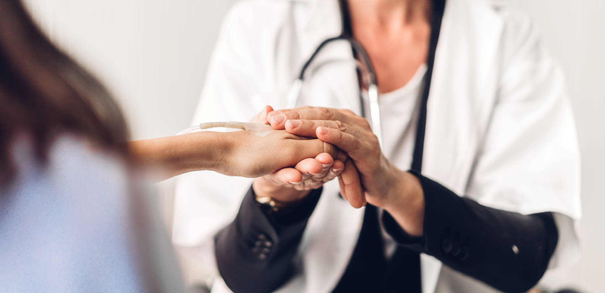 Woman Doctor Consulting And Holding Hand Patient Reassuring With Woman Doctor Consulting And Holding Hand Patient Reassuring With