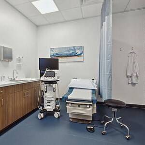 Pregnancy ultrasound scan in a clinic to confirm gestational age and location