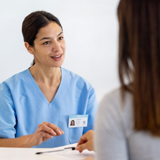 Nurse Talking To Patient Nurse Talking To Patient